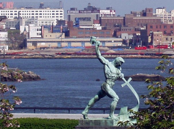 UN Statue man beating sword into plowshare from isiaiah, the bible